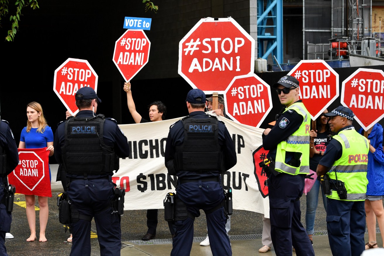 Anti-Adani coal mine protestors were prominent during the Queensland state election campaign. Photo: AAP/Darren England
