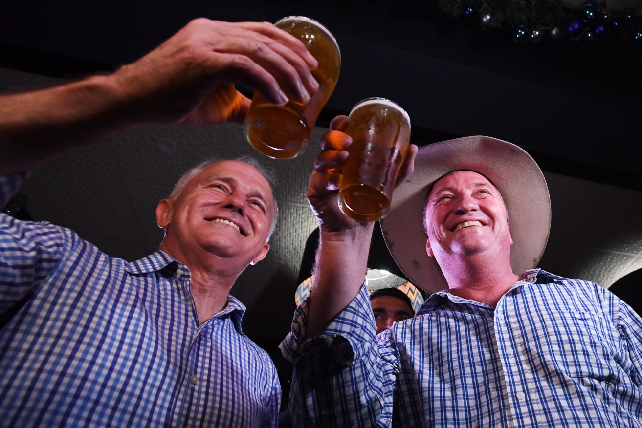 Prime Minister Malcolm Turnbull with Barnaby Joyce on Saturday. Joyce easily won the New England by-election. Photo: AAP/Tracey Nearmy