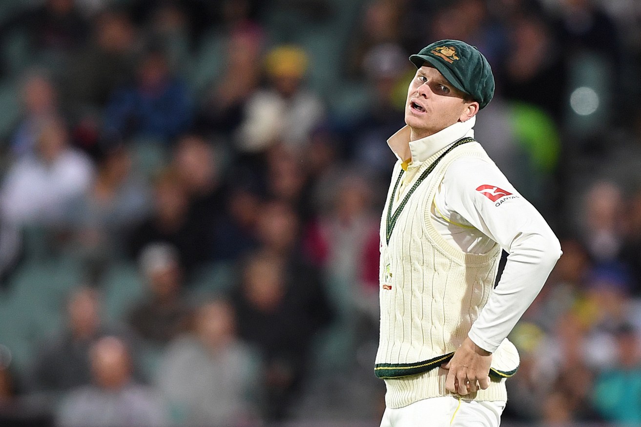 Steve Smith reacts to a dropped catch from the bat of England's Dawid Malan yesterday. Photo: Dave Hunt / AAP
