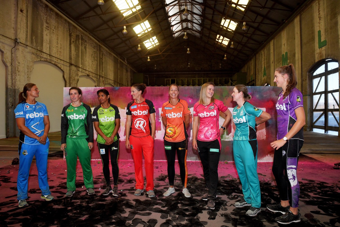 Suzie Bates of the Adelaide Strikers, Georgia Elwiss of the Melbourne Stars, Harmanpreet Kaur of the Sydney Thunder, Amy Satterthwaite of the Melbourne Renegades, Piepa Cleary of the Perth Scorchers, Ellyse Perry of the Sydney Sixers, Beth Mooney of the Brisbane Heat and Erin Fazackerley of the Hobart Hurricanes at yesterday's Sydney launch of the WBBL. Photo: Dan Himbrechts / AAP