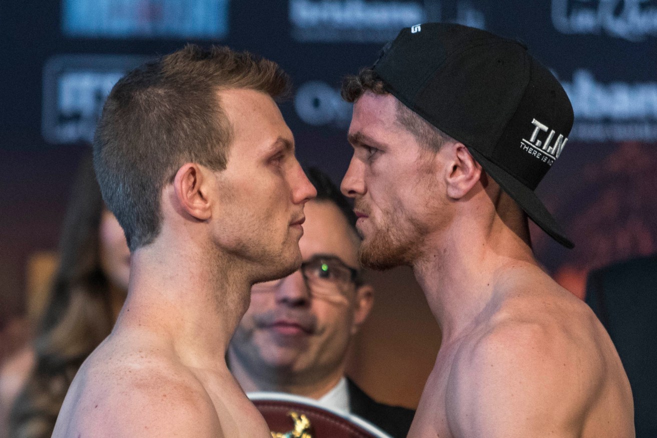 Jeff Horn and Gary Corcoran at the official weigh-in yesterday. Photo: Glenn Hunt / AAP