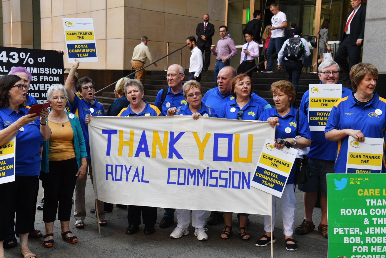 Supporters of the victims of child sexual abuse outside  the final public hearing of the Royal Commission into Institutional Responses to Child Sexual Abuse in Sydney. Photo: AAP/Mick Tsikas