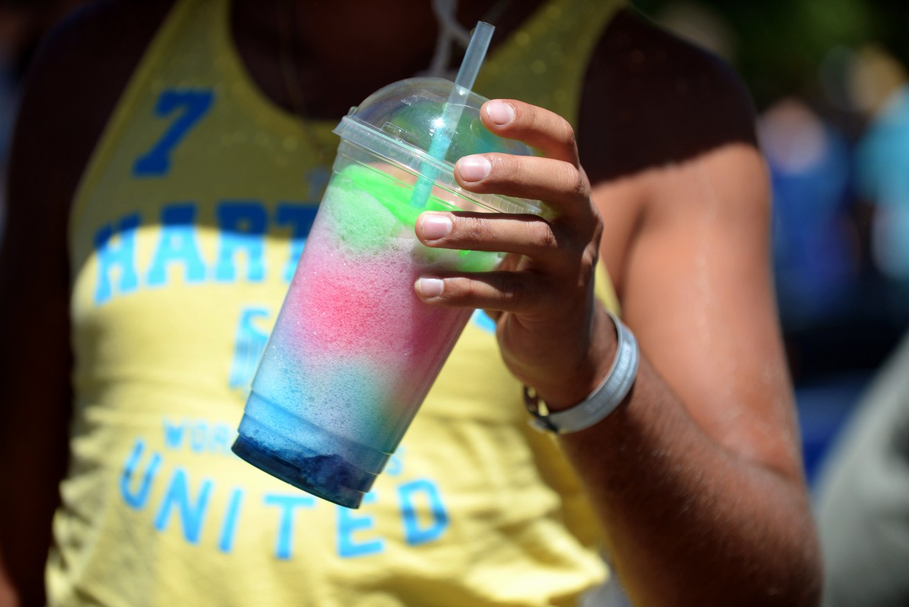 Some large frozen drinks contain half a week's worth of recommended sugar intake. Photo: AAP/Lukas Coch
