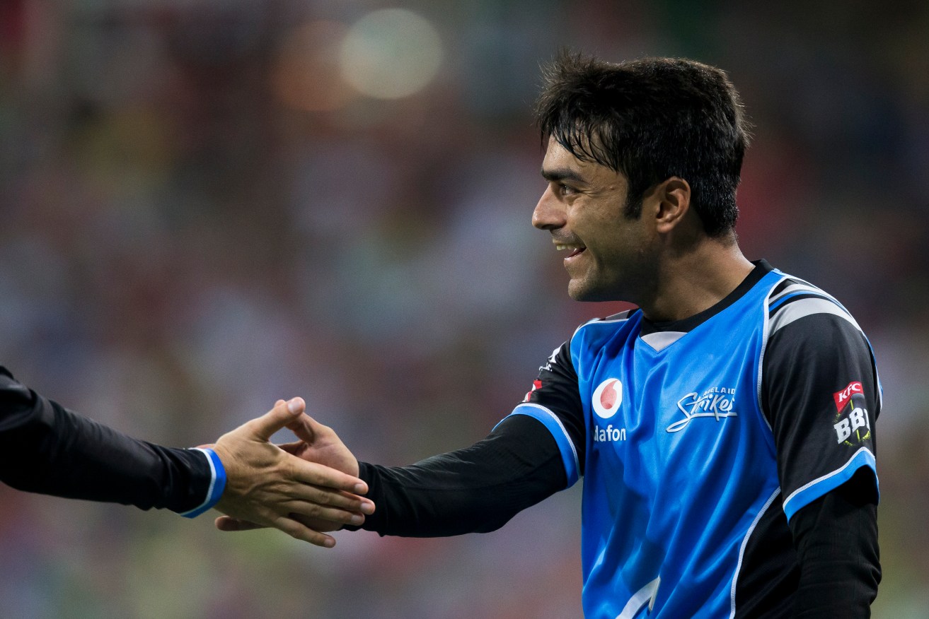 Rashid Khan capped off his night with a catch to end Chris Green's innings. Photo: Craig Golding / AAP