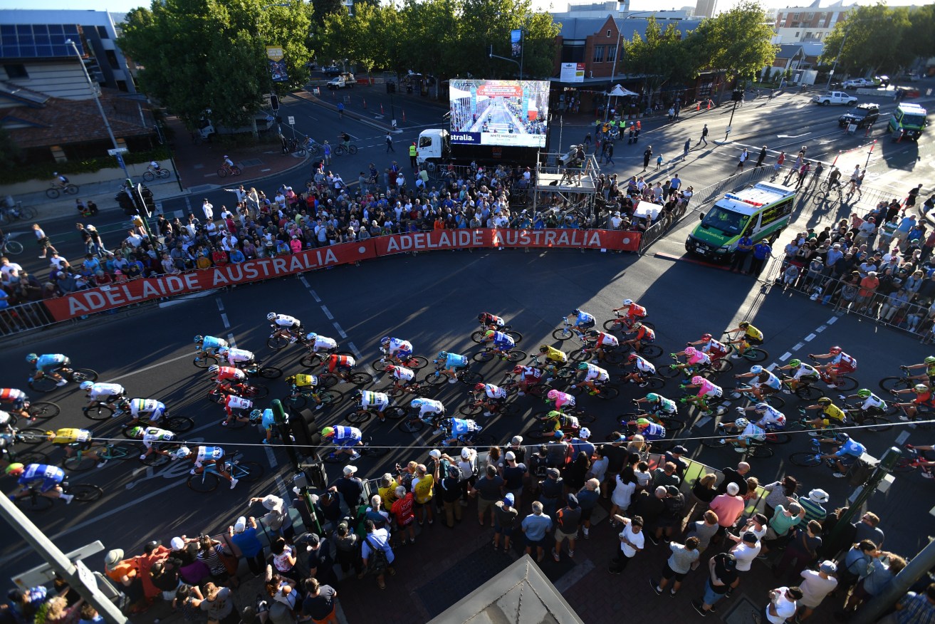The peloton during the People's Choice Classic at the Tour Down Under in the city on Sunday. Photo: AAP/David Mariuz