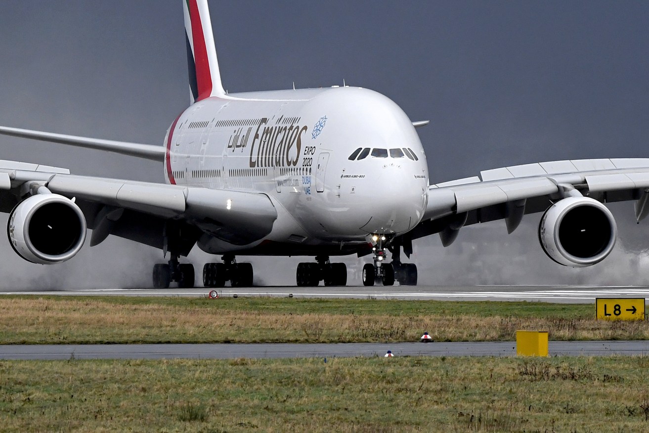 An Emirates Airbus A380-800 aircraft lands in  Duesseldorf. Photo: EPA/Sascha Steinbach