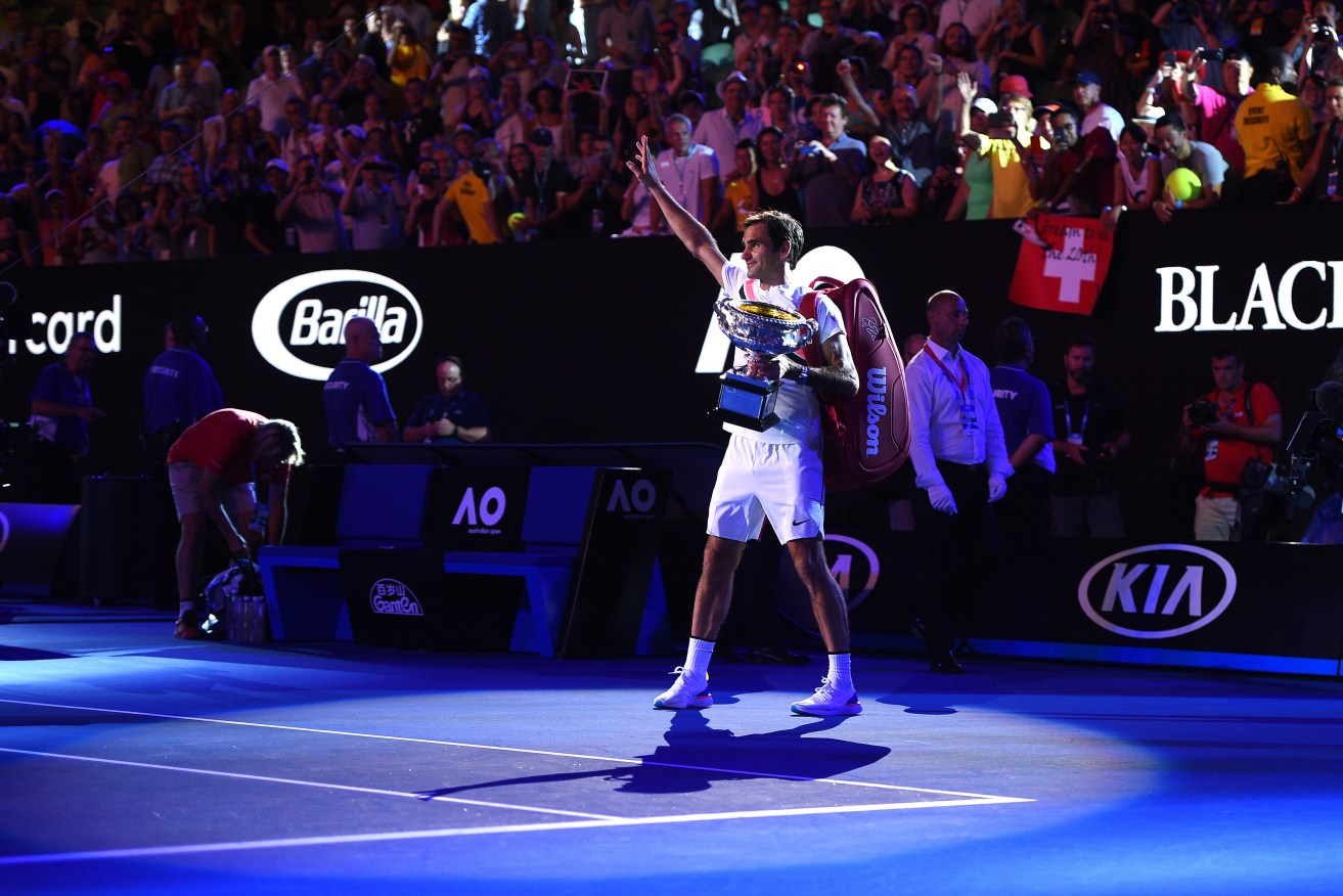 Roger Federer celebrates his sixth Australian Open title. Photo: Corinne Dubreuil/ABACAPRESS.COM