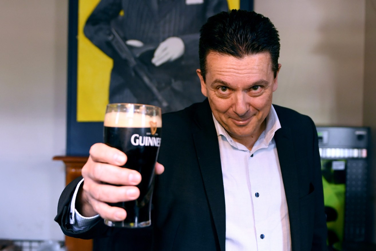 CHEERS: Nick Xenophon might have something to celebrate come March. Photo: Mark Brake / AAP