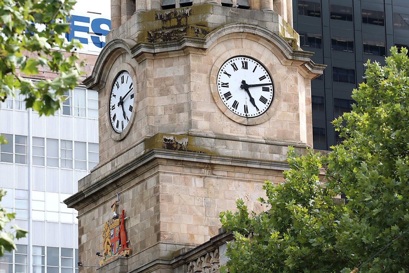 The clock on Albert Tower has been stuck at 13 minutes past five. Photo: Tony Lewis / InDaily