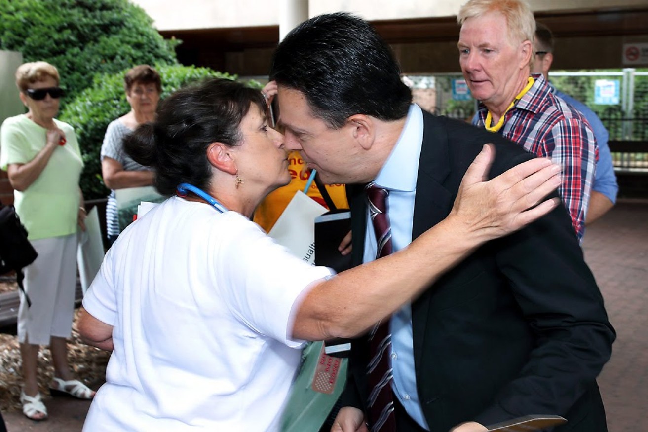 Frances Bedford greets Nick Xenophon as he arrives for their press conference at Modbury Hospital today. Photo: Tony Lewis/InDaily