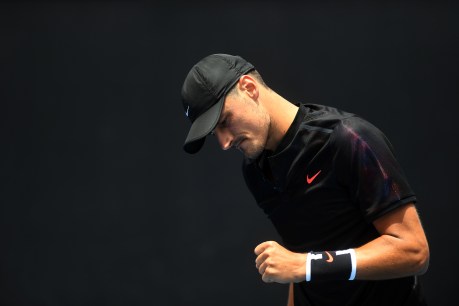 Tomic admits he wasted an entire year