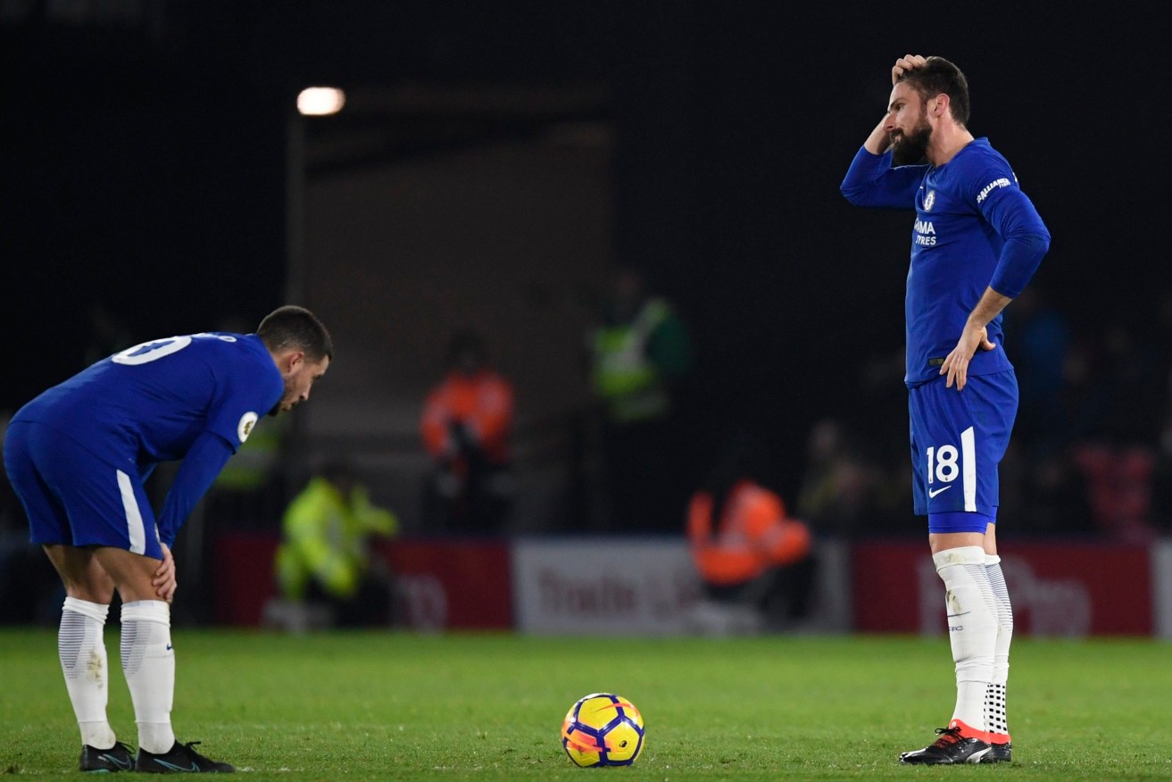 Chelsea's Eden Hazard (left) and Olivier Giroud react after Watford score at Vicarage Road Stadium. Photo: EPA/Will Oliver