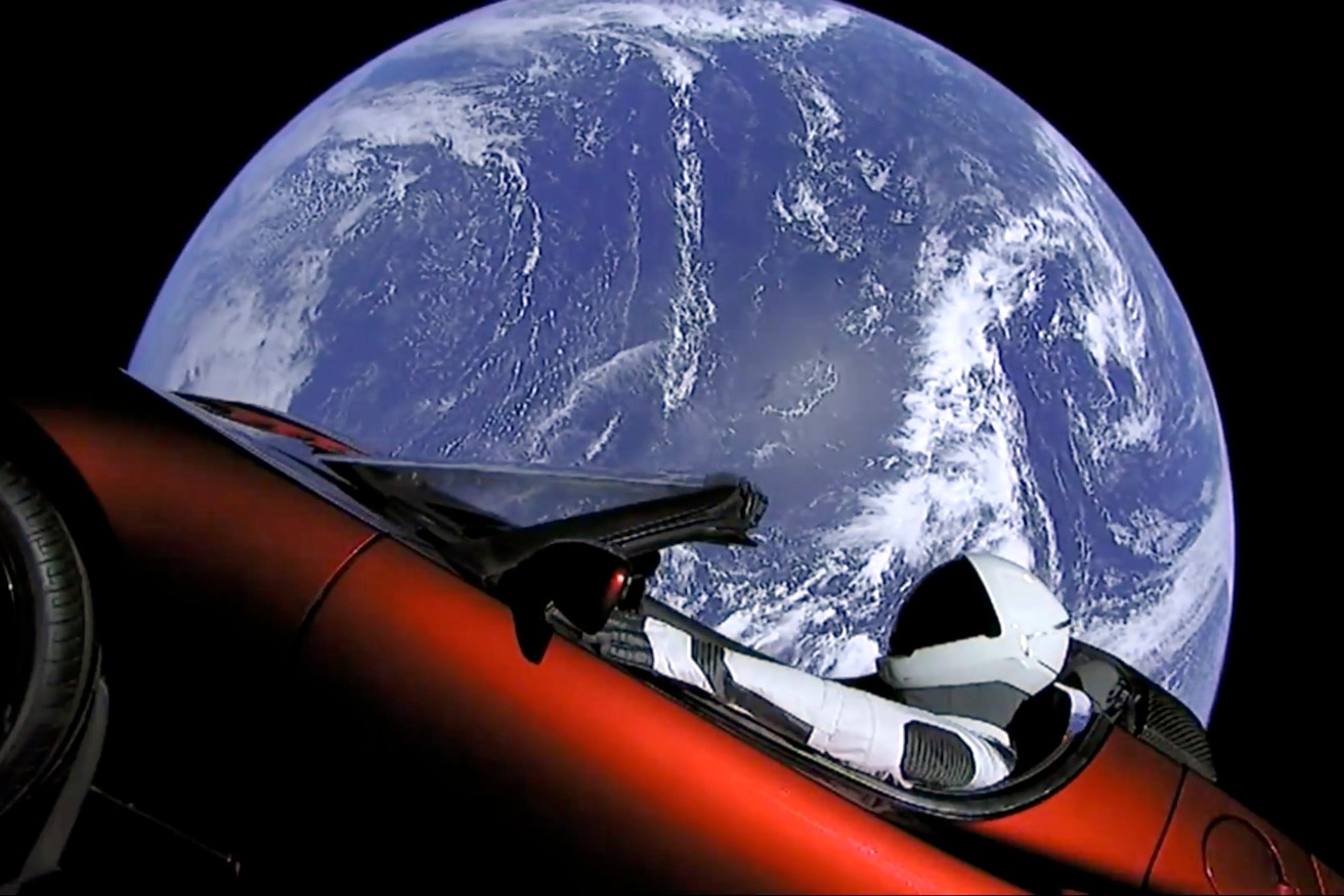 Elon Musk's red Tesla sports car which was launched into space today. Photo: SpaceX via AP
