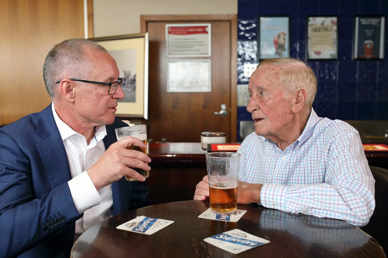 MEMORIES: Jay Weatherill shares a pint with his dad, former Labor MLC George Weatherill, at the Lockleys Hotel at the start of the election campaign. Photo: Tony Lewis / InDaily