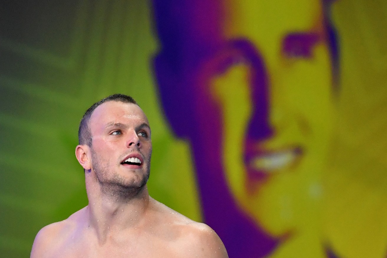 Kyle Chalmers after winning the final of the 100 metre freestyle at the swimming trials. Photo: AAP/Darren England