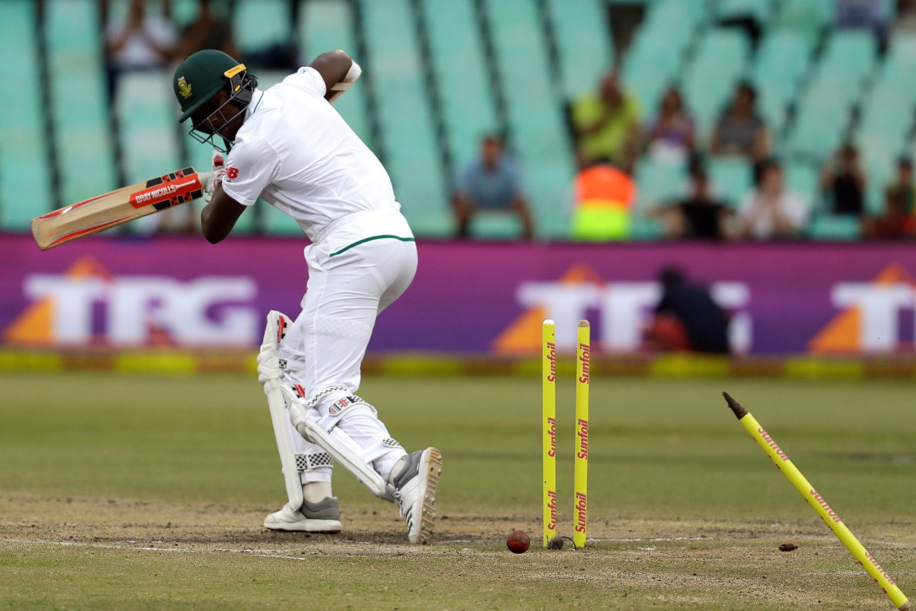 South Africa's batsman Kagiso Rabada is bowled by Mitchell Starc for a duck. Photo: AP/Themba Hadebe