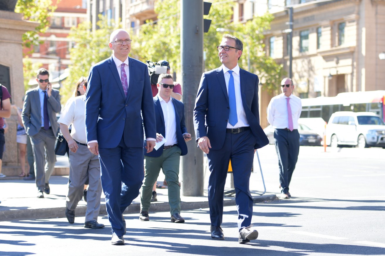 Turn left to Waymouth Street: David Pisoni and Steven Marshall leave yesterday's press conference. Photo: AAP/Tracey Nearmy