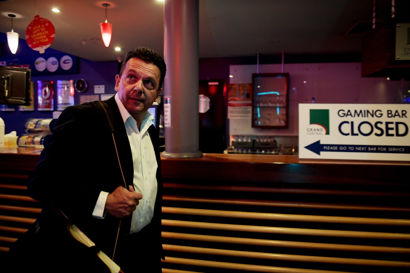 Nick Xenophon arrives for last night's final election debate. Photo: AAP/Tracey Nearmy