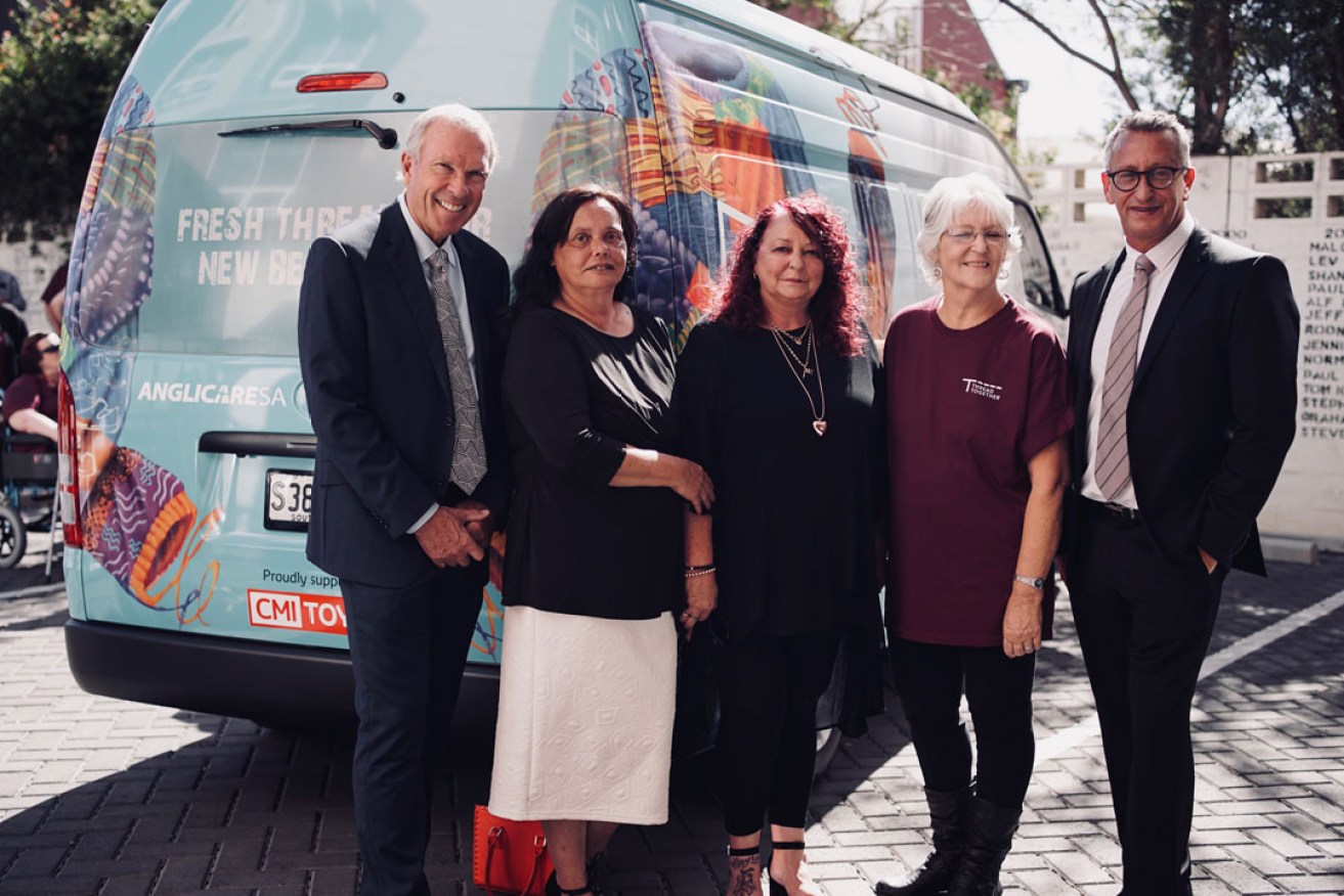 CMI Toyota managing director Paul Crawford, Olive Bennell from AnglicareSA, volunteers Pam Aulich and Helen Power and Thread Together CEO Greg Fisher at today's "Mobile Wardrobe" launch. Photo: Israel Baldago