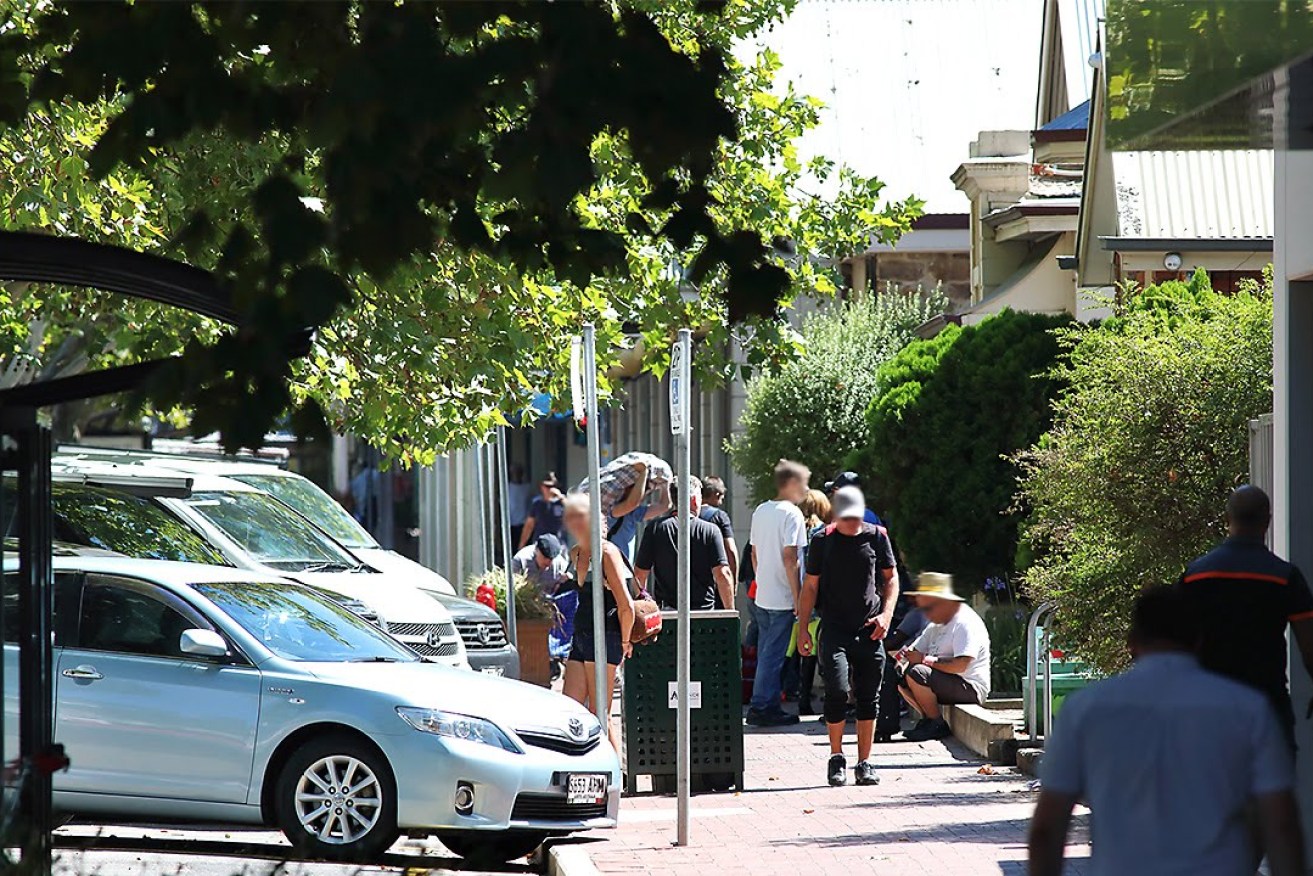 People gather in front Hutt Street Centre. Photo: Tony Lewis / InDaily