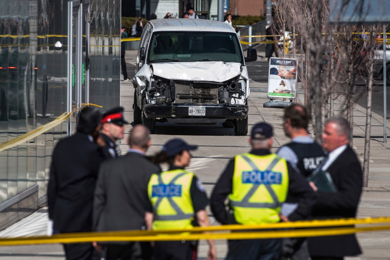 Police near the scene of the tragedy in Toronto. Photo: AP