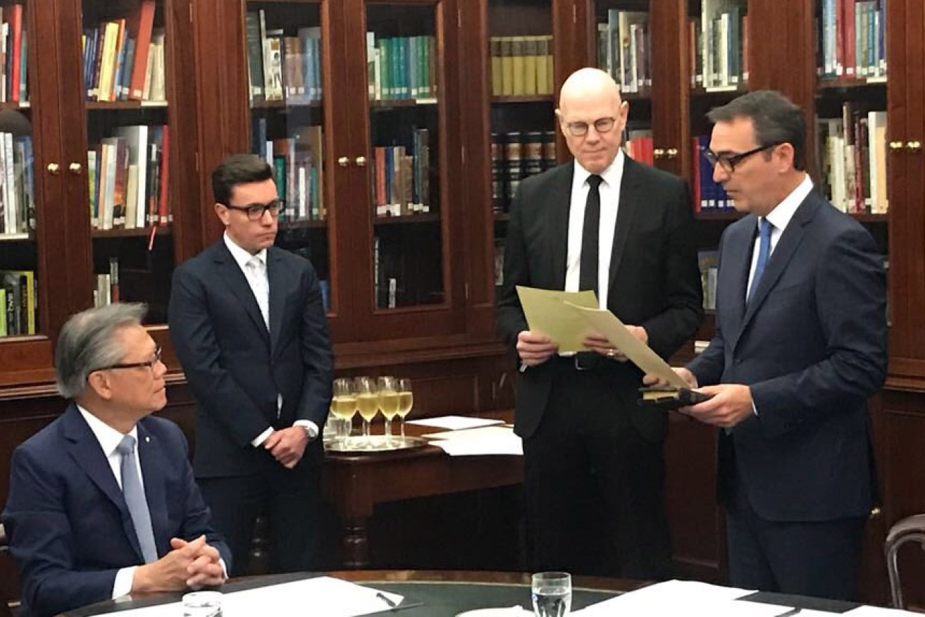 Steven Marshall being sworn in as Premier last month, flanked by the chief executive of the Department of Premier and Cabinet Don Russell (third from left), who was subsequently sacked as part of a public service purge. Photo: Twitter