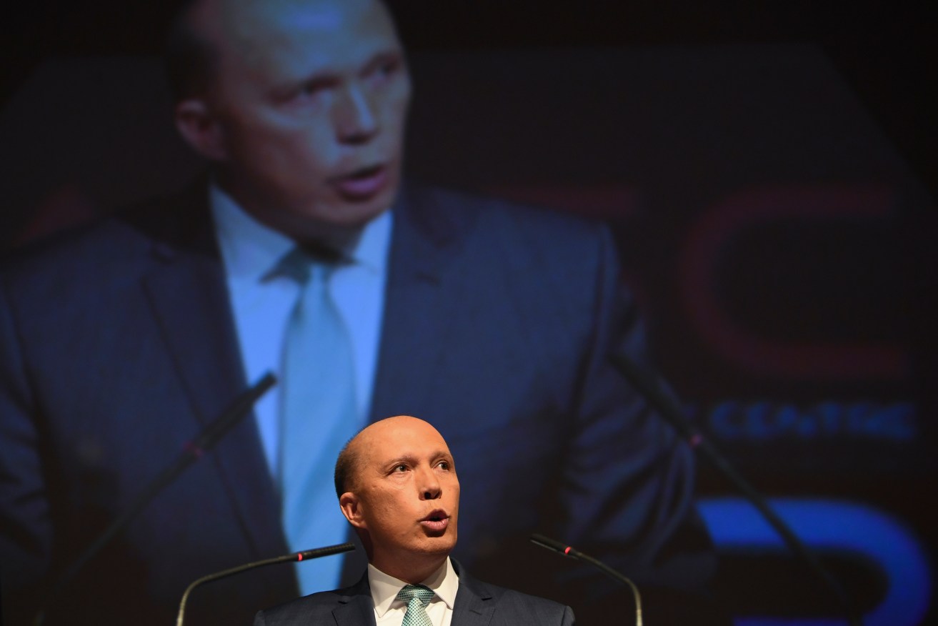 Home Affairs Minister Peter Dutton's identify matching bill has 'Orwellian' overtones. Photo: AAP/Lukas Coch