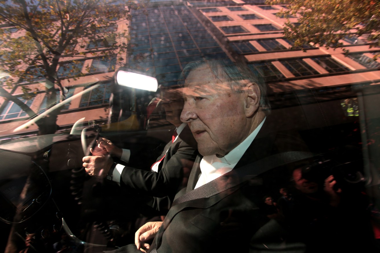 Cardinal George Pell departs the Melbourne Magistrates Court in Melbourne today. Photo: AAP/Stefan Postles