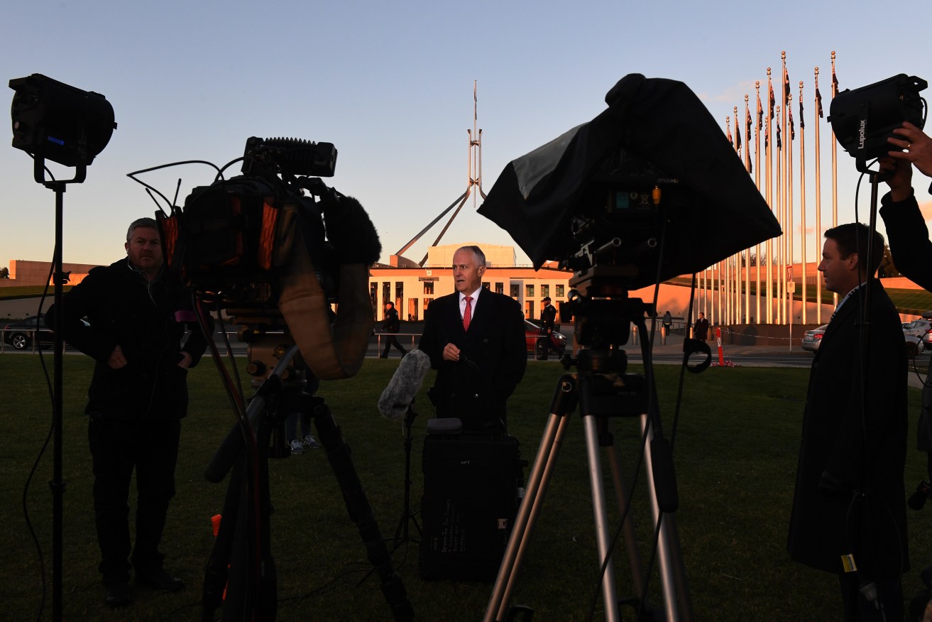 Prime Minister Malcolm Turnbull talking to a breakfast television program the day after the federal budget. Photo: AAP/Dean Lewins