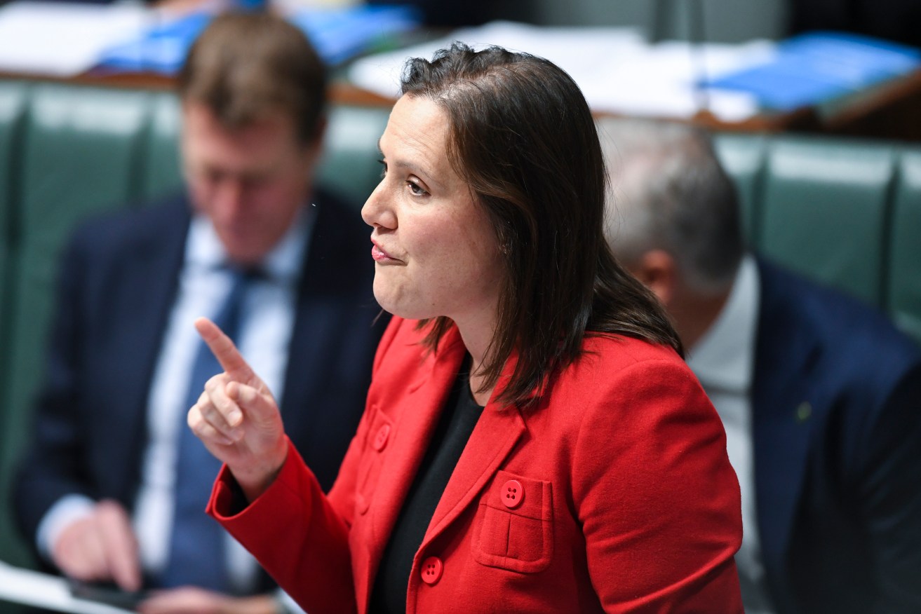 Financial Services Minister Kelly O'Dwyer says low-income workers are being ripped up in the super system. Photo: AAP/Lukas Coch