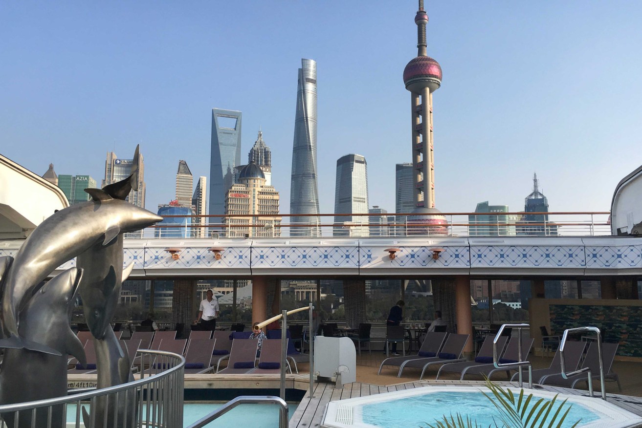 A view of the Shanghai skyline through the open roof area on Holland America's Volendam. Photo: Darren Cartwright / AAP