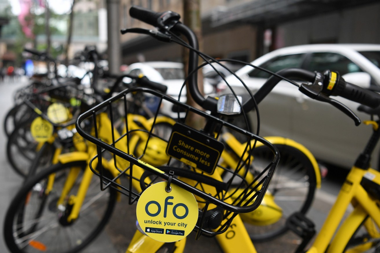 Ofo's distinctive yellow bikes. Photo: AAP / David Moir
