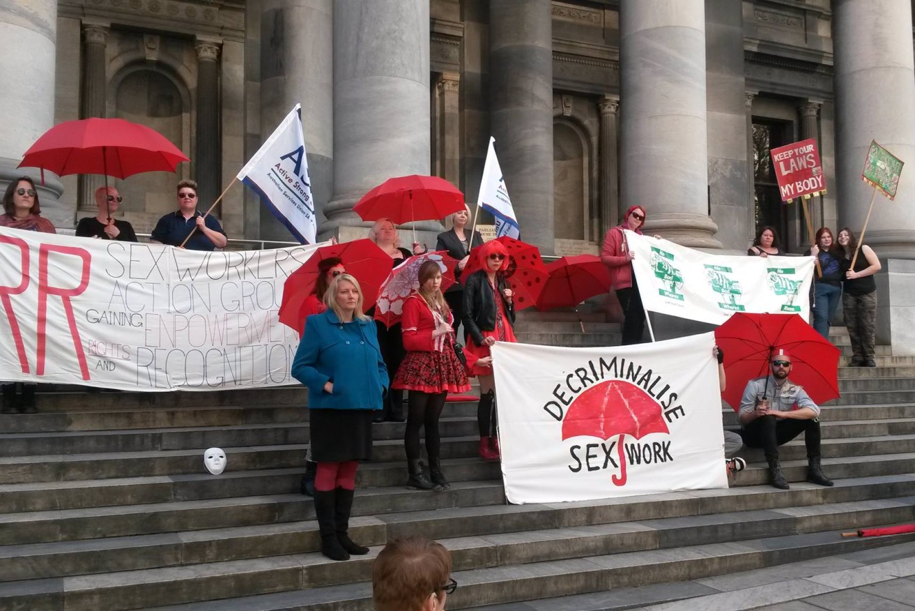 Sex worker advocates outside Parliament House at last year's rally. Photo: Facebook