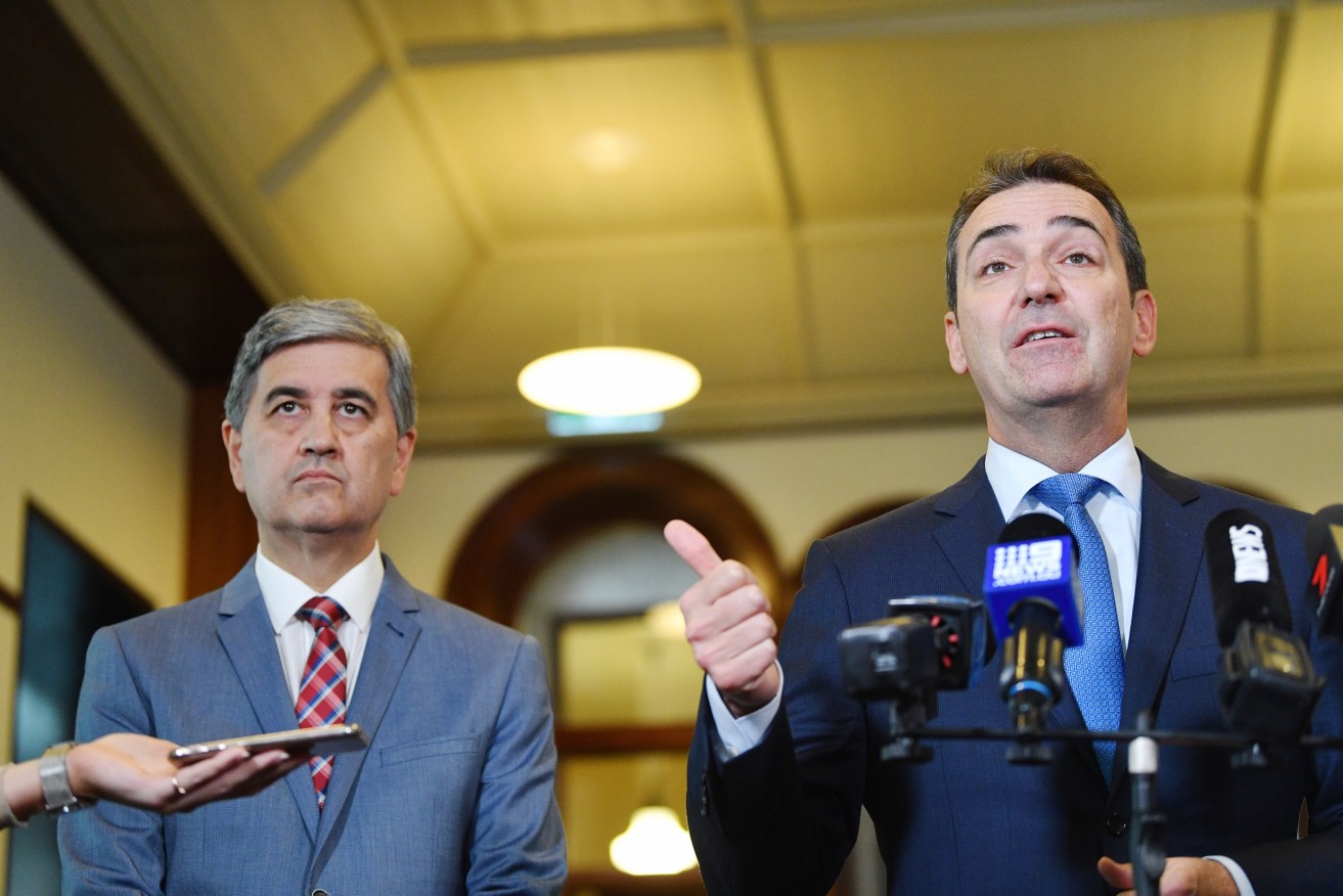 Treasurer Rob Lucas and Premier Steven Marshall are gearing up for a political dogfight on shop trading reform. Photo: David Mariuz / AAP