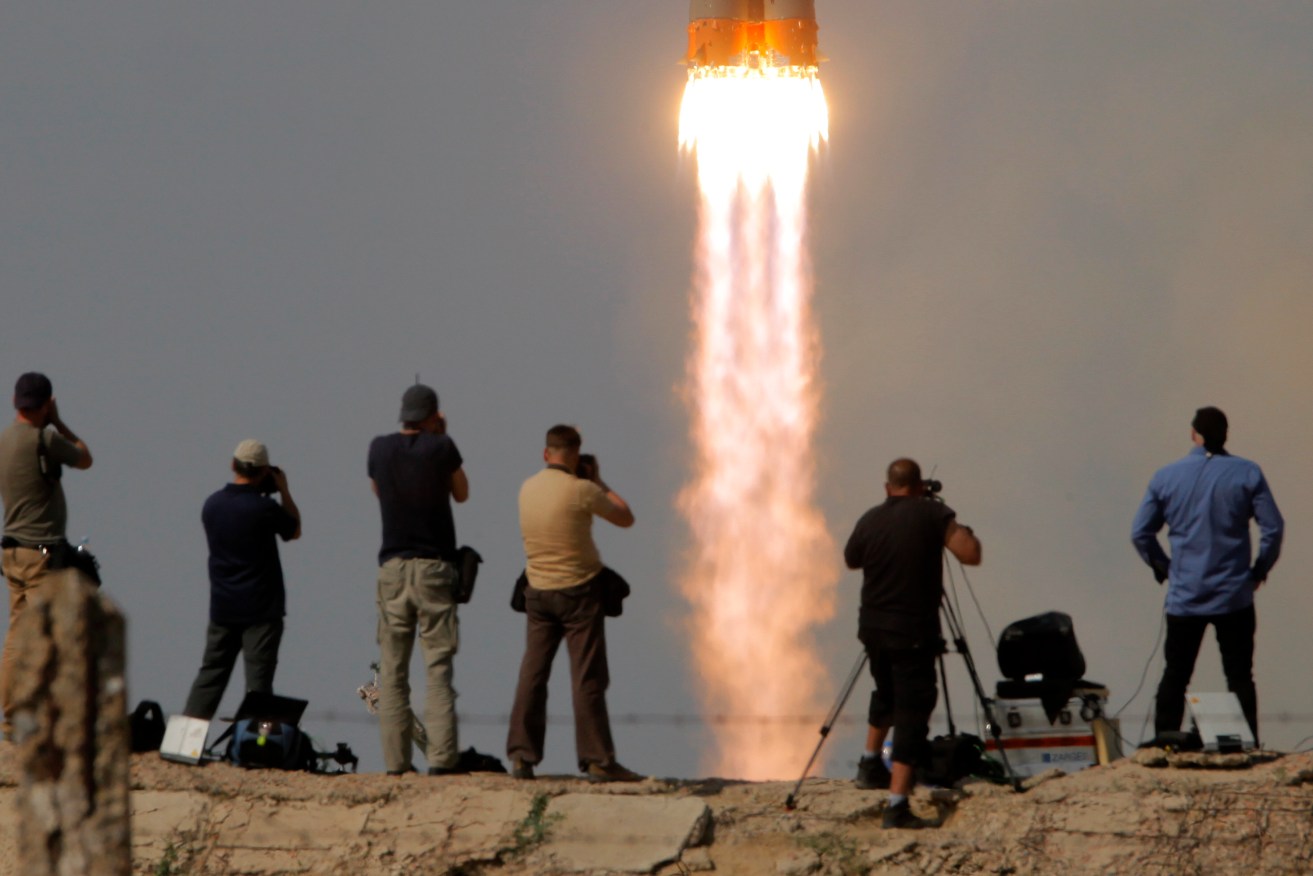 A rocket carrying a new crew to the International Space Station blasts off at the Russian leased Baikonur cosmodrome in Kazakhstan last year. Photo: AP/Dmitri Lovetsky