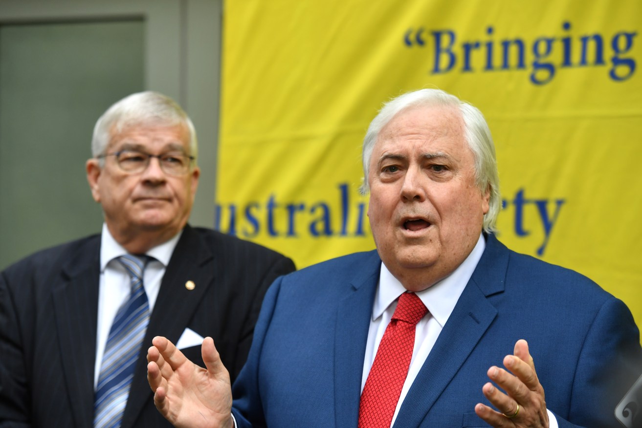 Former One Nation Senator Brian Burston (left) with Clive Palmer at Parliament House in Canberra today. Photo: AAP/Mick Tsikas