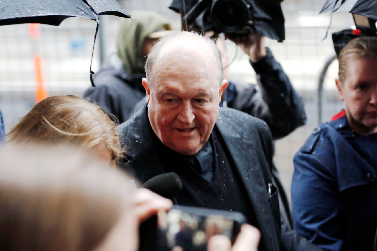 Archbishop Philip Wilson arrives at Newcastle Local Court for his sentencing hearing today. Photo: AAP/Darren Pateman