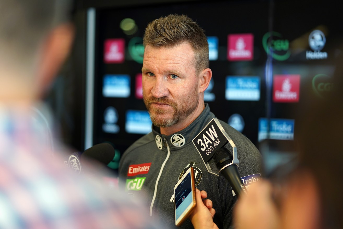 Collingwood coach Nathan Buckley fears mooted rule changes would slow down the game. Photo: AAP/Alex Murray
