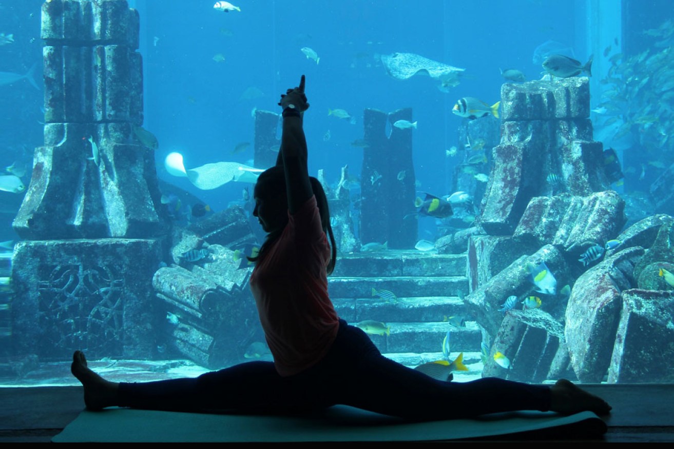 Yoga in the Lost Chambers Aquarium at Dubai's Atlantis The Palm.