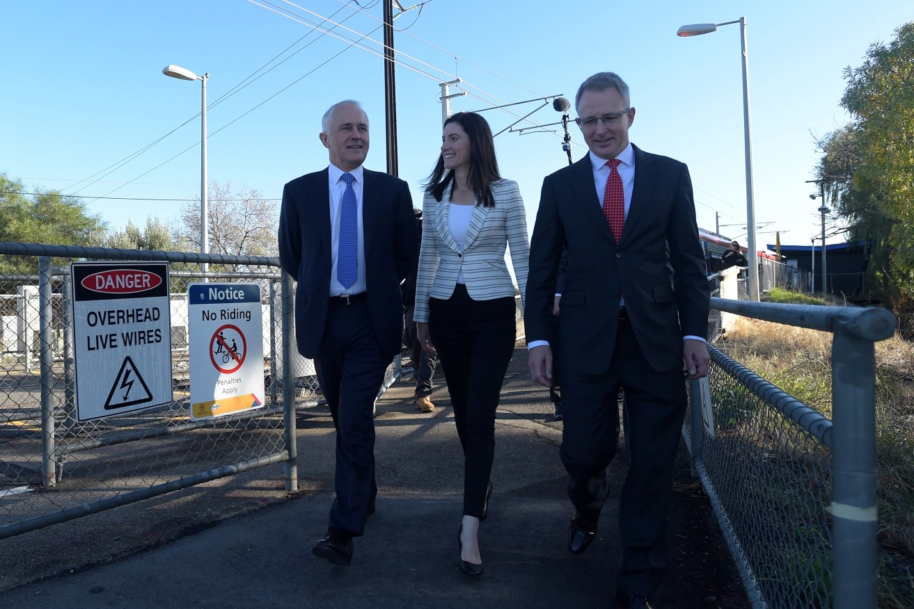 Boothby incumbent Nicolle Flint with PM Malcolm Turnbull and Major Projects Minister Paul Fletcher during the 2016 federal election campaign. Photo: Lukas Coch / AAP