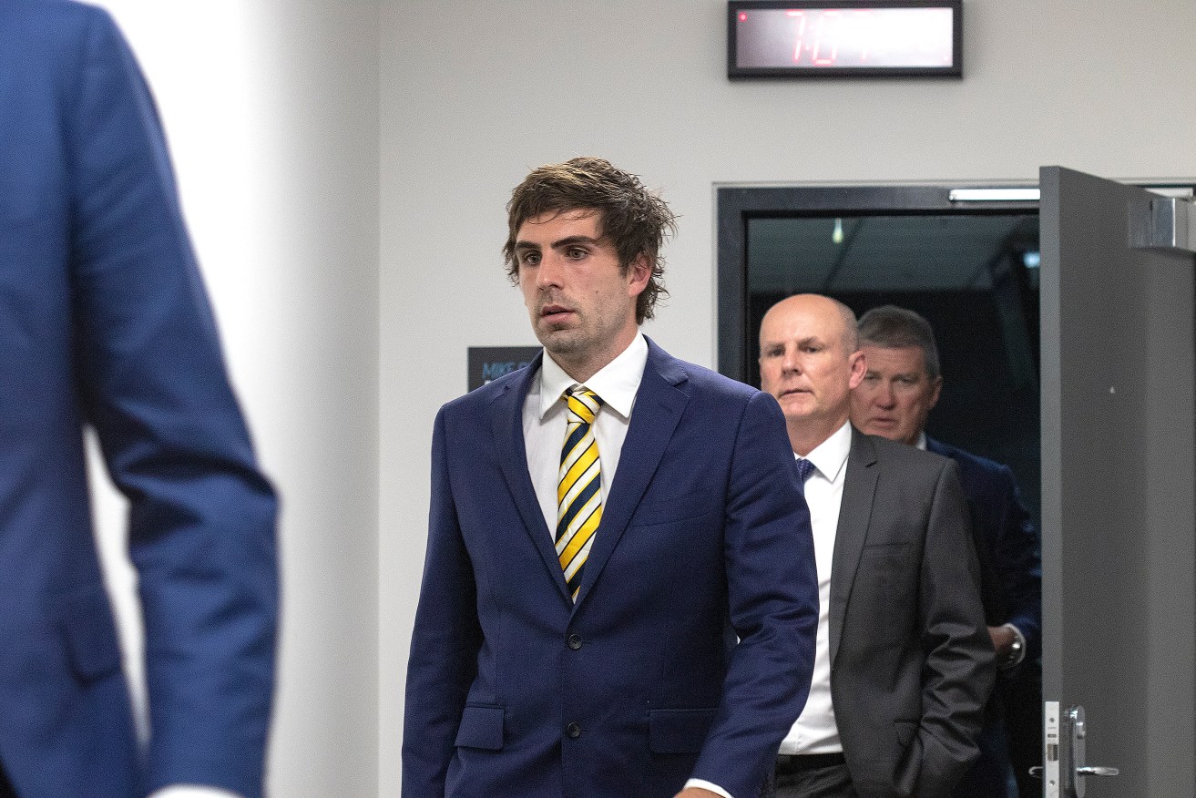 West Coast Eagles midfielder Andrew Gaff departs the AFL tribunal after being banned for eight weeks. Photo: AAP/Luis Ascui