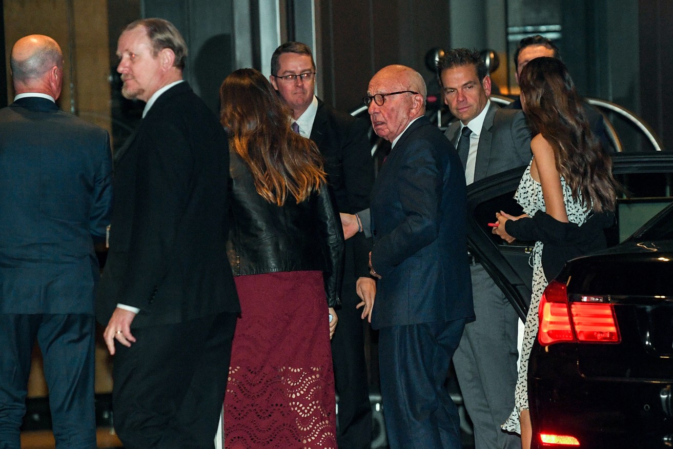 News Corp co-executive Rupert Murdoch, seen here arriving at last week's News Awards ceremony with his son Lachlan  (second right), was in Australia this month. Photo: Brendan Esposito / AAP