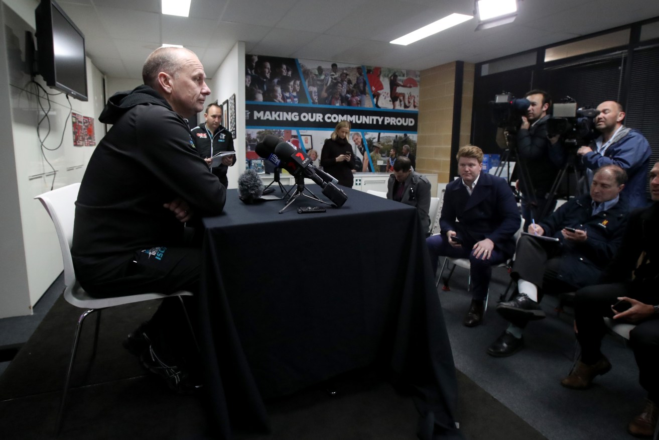 Port Adelaide coach Ken Hinkley at a press conference. Photo: AAP/Kelly Barnes