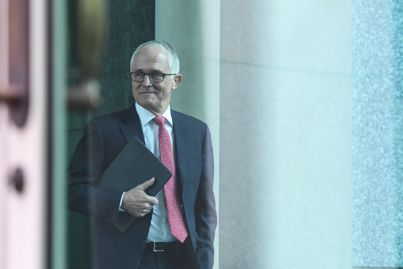 Prime Minister Malcolm Turnbull arrives for a party room meeting at Parliament House today. Photo: AAP/Lukas Coch