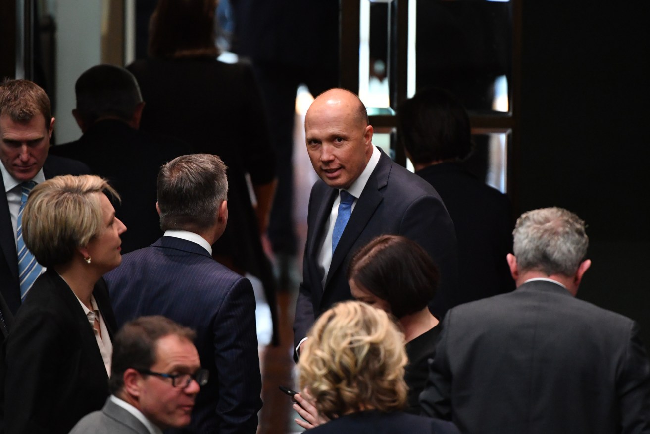 Former minister for Home Affairs Peter Dutton leaves after a division in the House of Representatives. Photo: AAP/Mick Tsikas