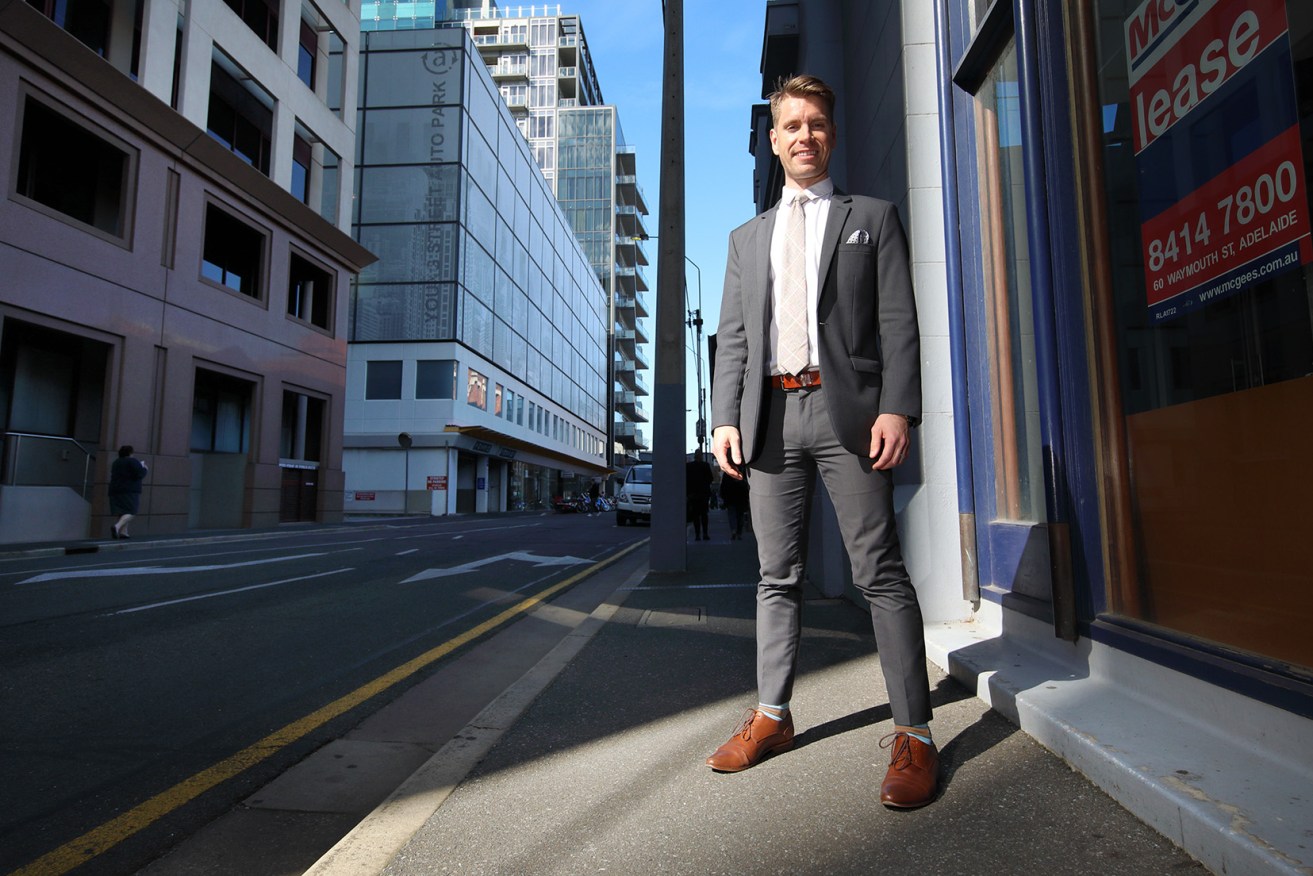 Central Ward candidate and former Greens staffer Sam Taylor says all or most of the city's footpaths should be replaced with higher-quality pavers. Photo: Tony Lewis / InDaily