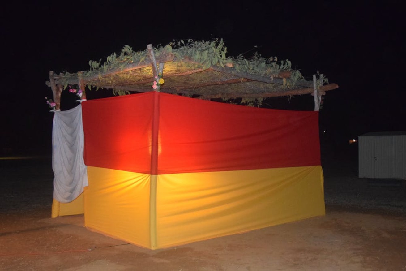 A bough shelter made for the funeral of W. Willika in the remote Northern Territory community of Barunga. Photo: Claire Smith
