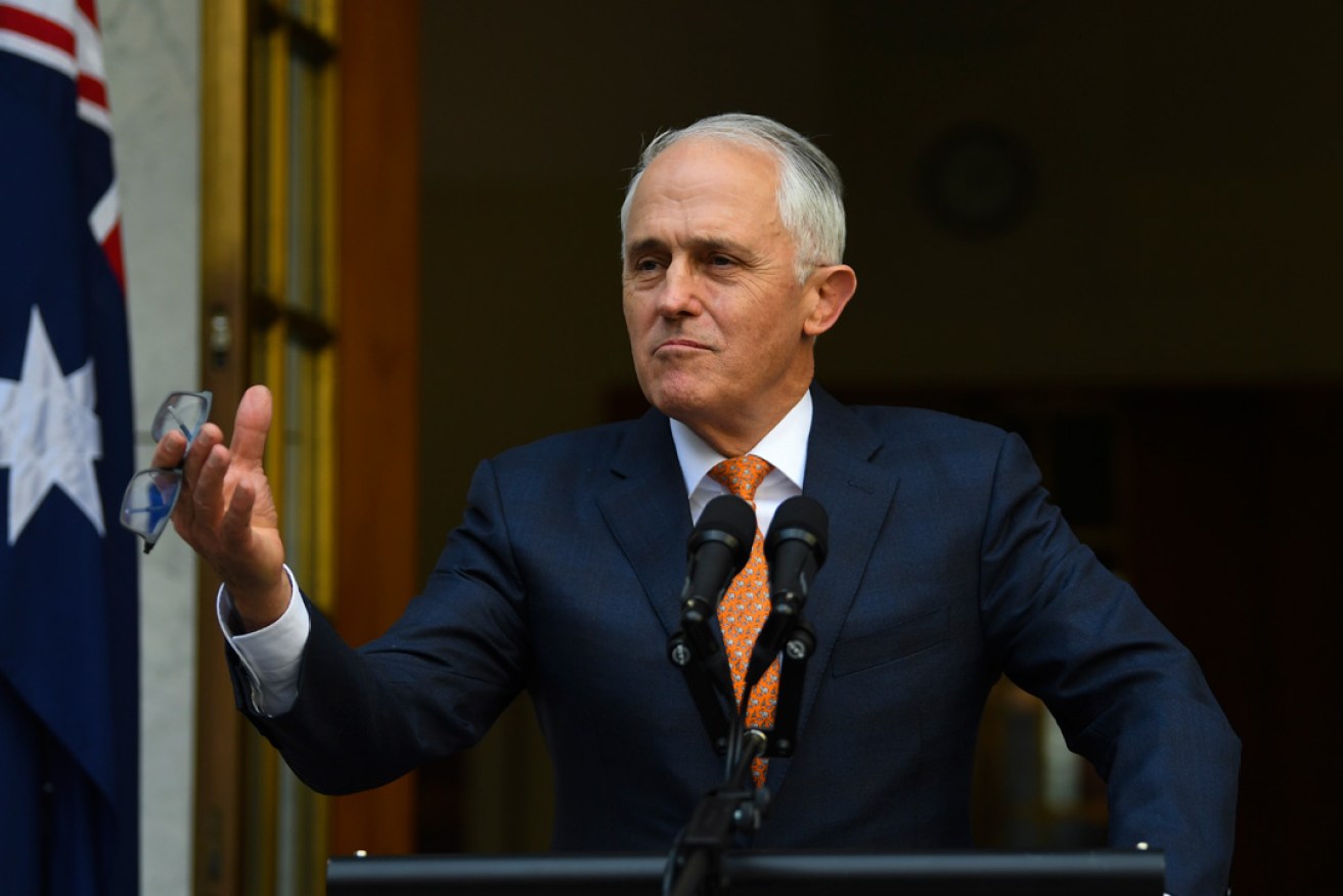 Outgoing Prime Minister addressing reporters at his final press conference in the role today. Photo: AAP / Lukas Coch