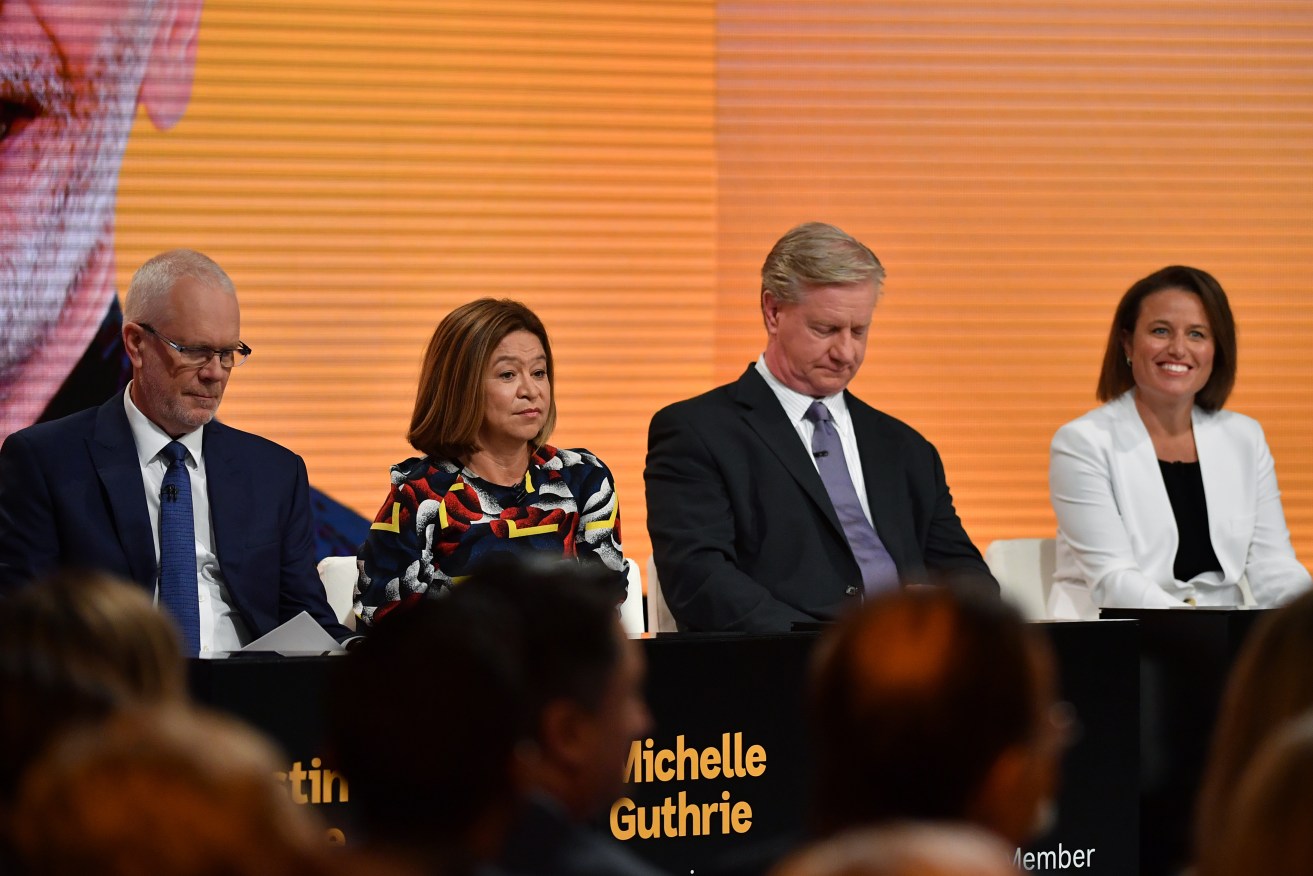 Dr Kristin Ferguson (in white jacket at right) with then ABC chairman Justin Milne (left) then managing director Michelle Guthrie, and board member Peter Lewis in February. Photo: AAP/Joel Carrett
