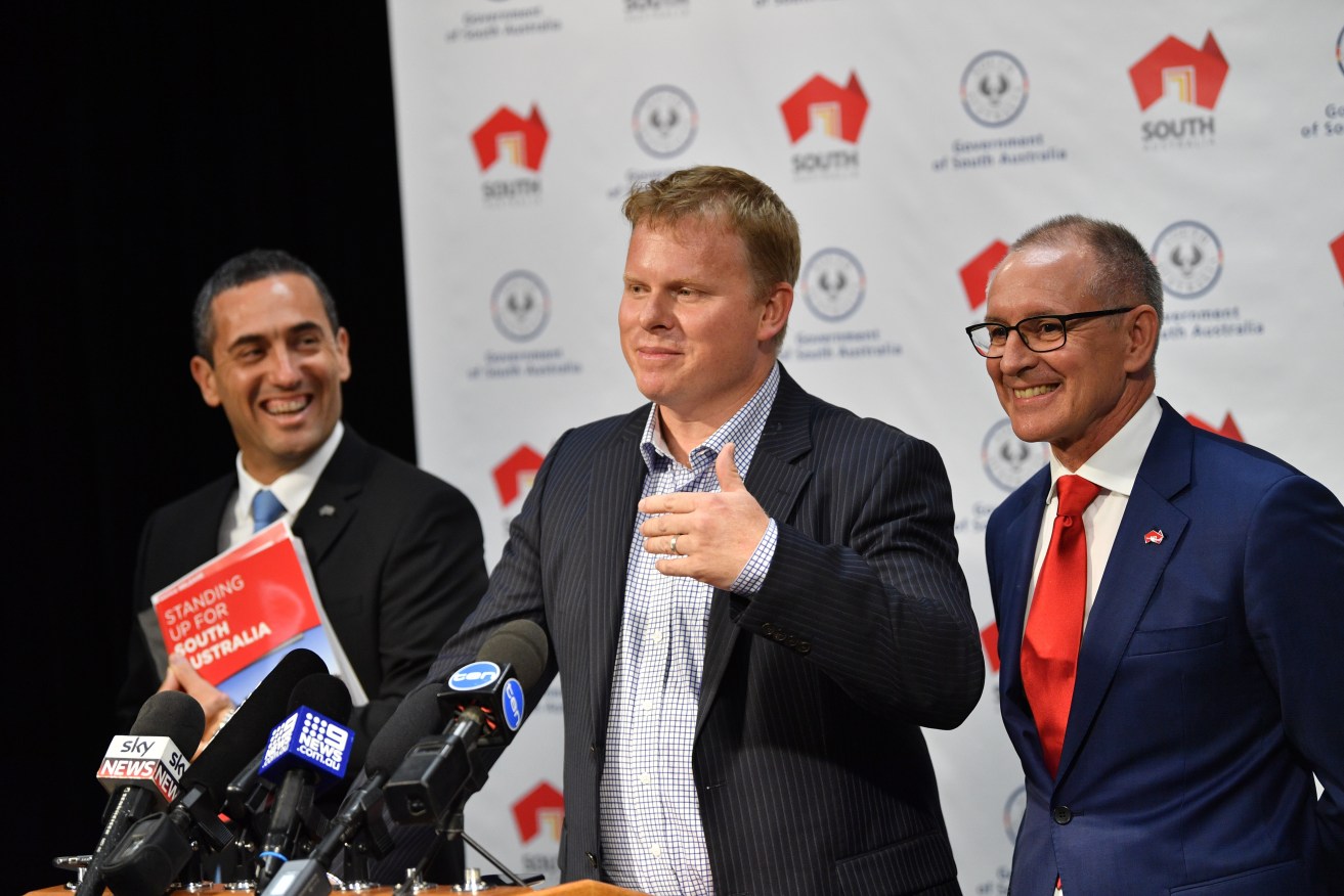 Sonnen Australia managing director Chris Parratt with then Premier Jay Weatherill and Tom Koutsantonis in February. Photo: AAP/David Mariuz
